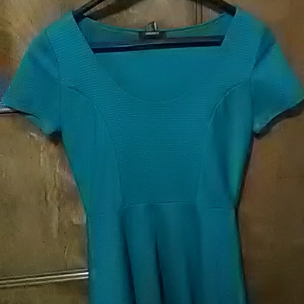 Teal ribbed skater dress.